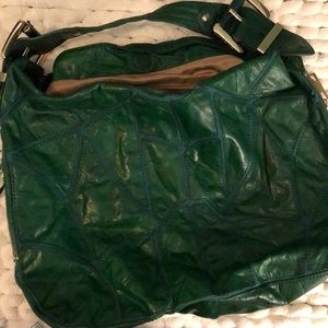 Handbag with gold buckle accents